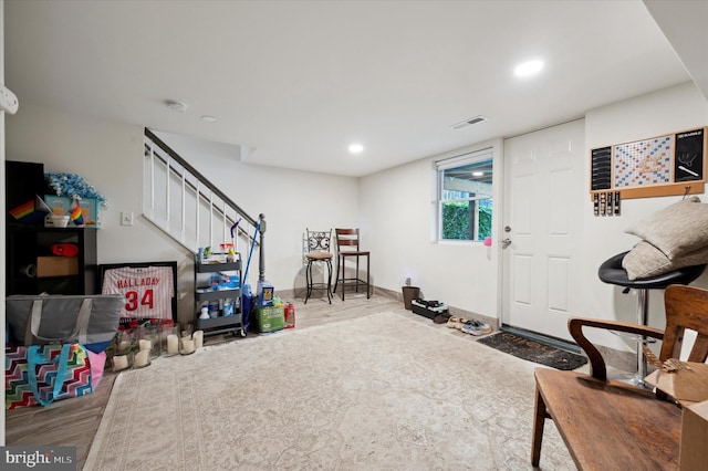 recreation room with hardwood / wood-style flooring