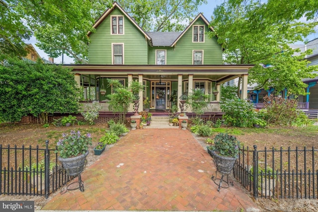 victorian-style house with covered porch