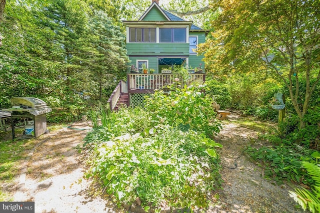 exterior space featuring a wooden deck