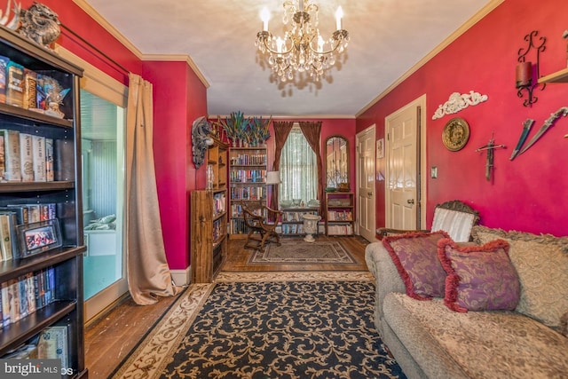 living area with wood-type flooring, crown molding, and a notable chandelier