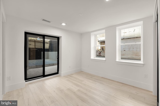 empty room featuring light hardwood / wood-style flooring