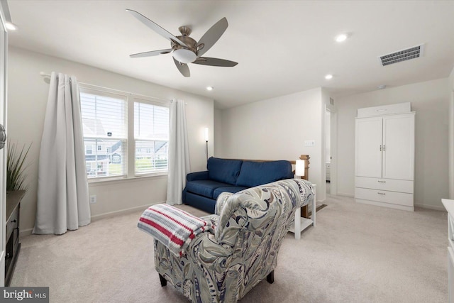 interior space featuring light carpet, baseboards, visible vents, a ceiling fan, and recessed lighting