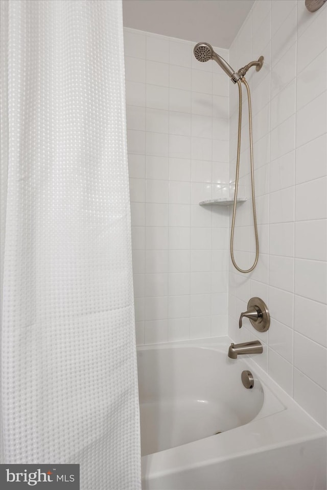 bathroom featuring shower / bath combination with curtain