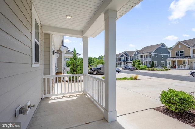 view of patio featuring a residential view and covered porch