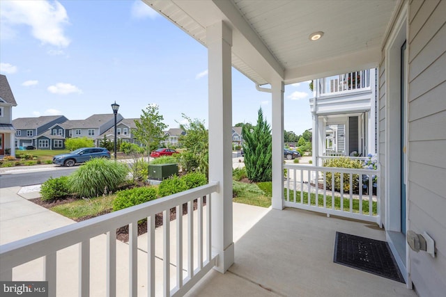 balcony with a porch and a residential view