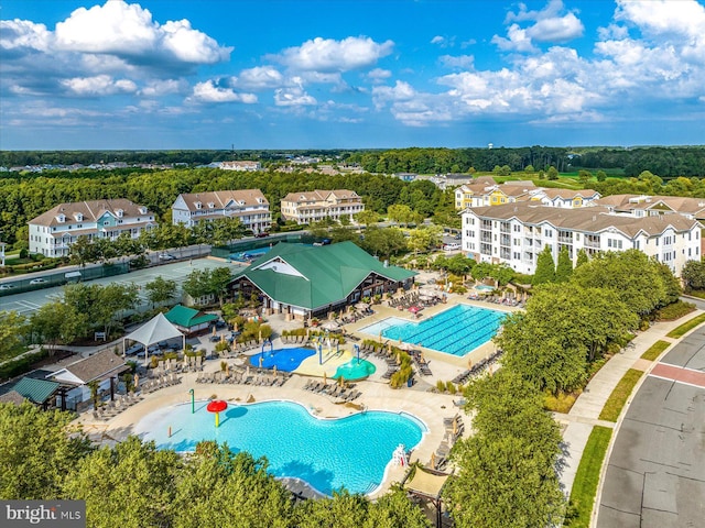 birds eye view of property with a residential view