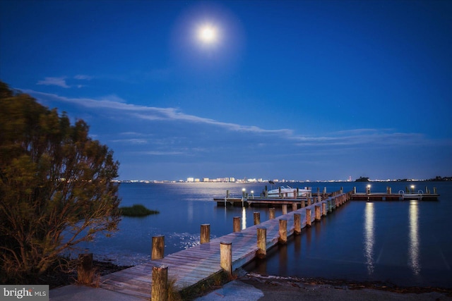 view of dock with a water view