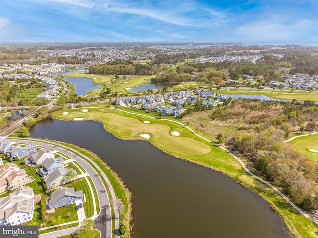 drone / aerial view with a water view, a residential view, and golf course view