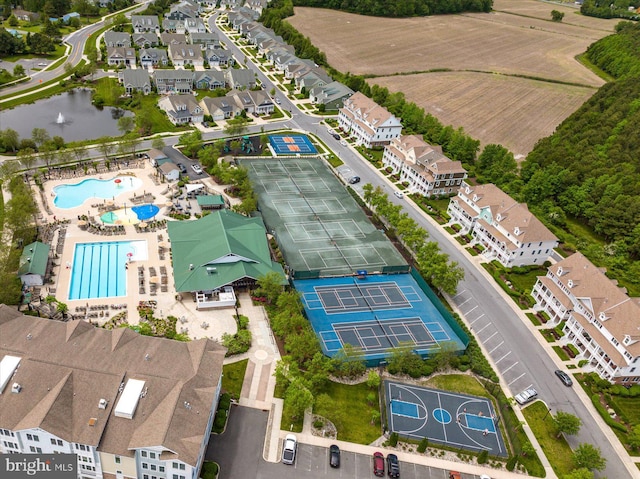 birds eye view of property with a residential view