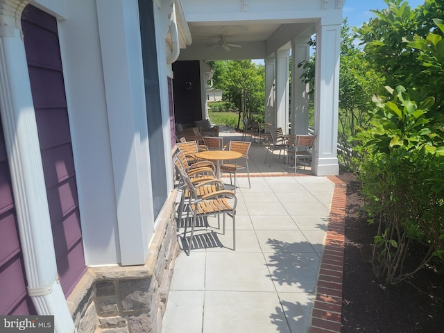 view of patio with a porch and ceiling fan