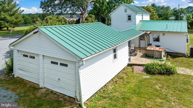 garage featuring a yard