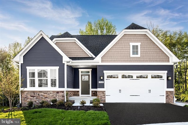 craftsman inspired home with a front yard