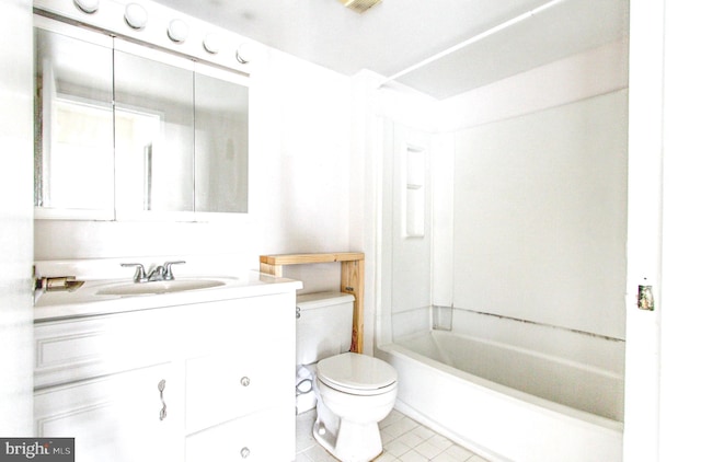 full bathroom featuring tile patterned floors, vanity, toilet, and shower / bath combination