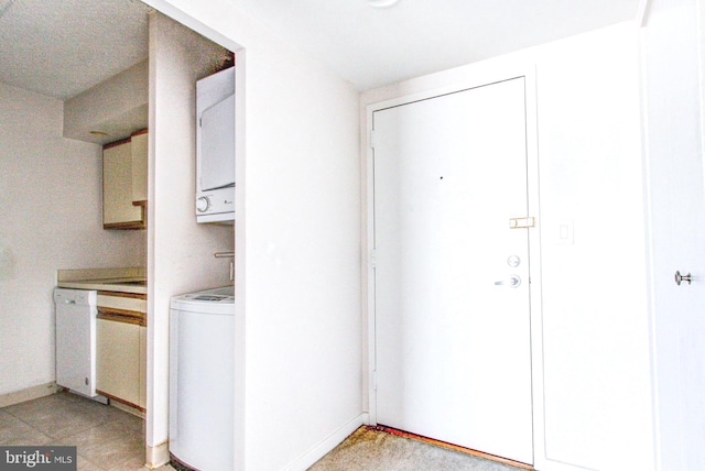 interior space with stacked washer / drying machine