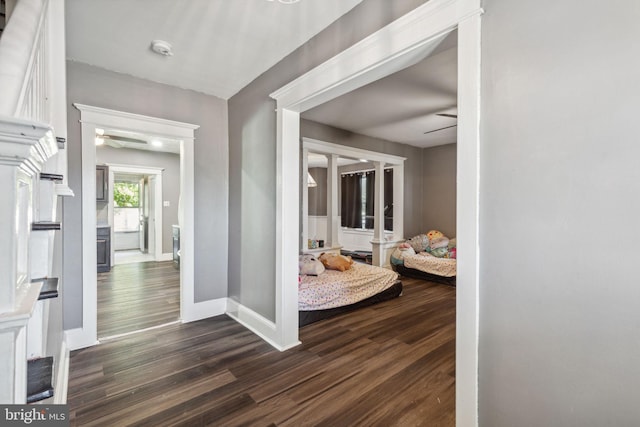 hallway featuring dark wood-type flooring