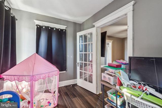 game room featuring dark hardwood / wood-style flooring