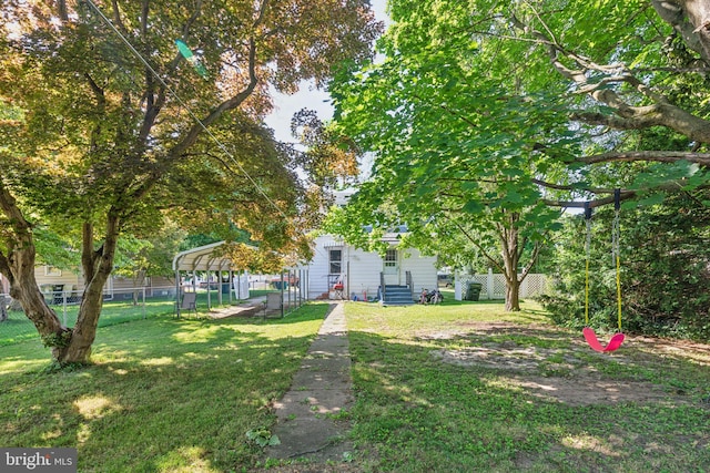 view of yard with a carport