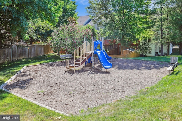 view of jungle gym with a yard