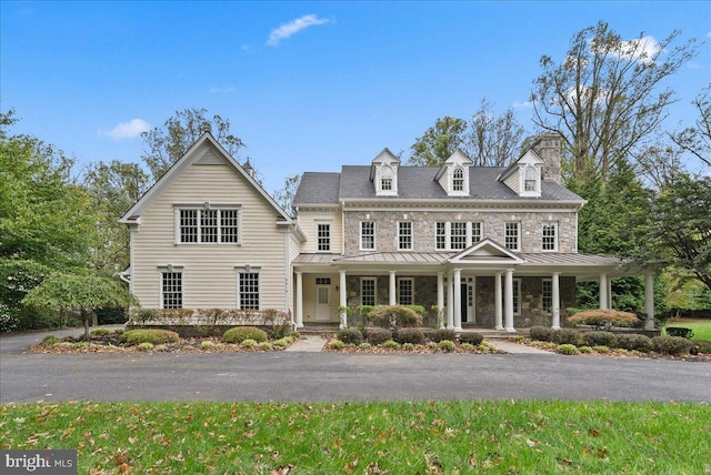 view of front facade featuring covered porch