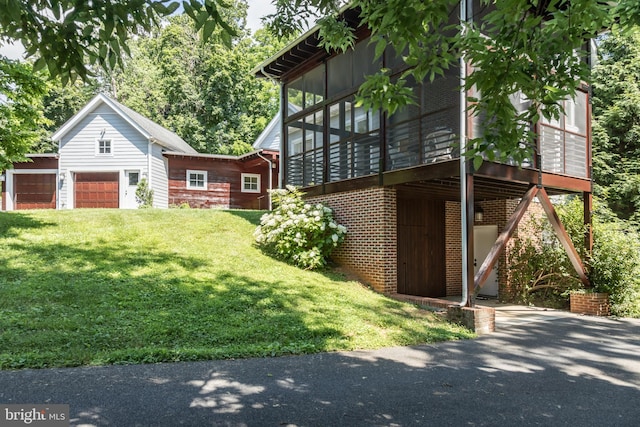 view of yard featuring a garage and a deck