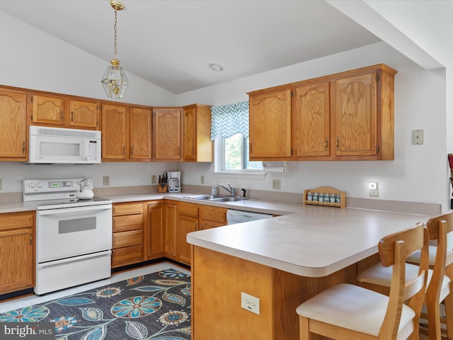 kitchen featuring sink, kitchen peninsula, pendant lighting, vaulted ceiling, and white appliances