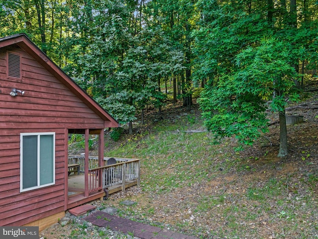 view of yard featuring a deck