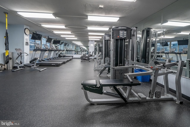 workout area with a textured ceiling