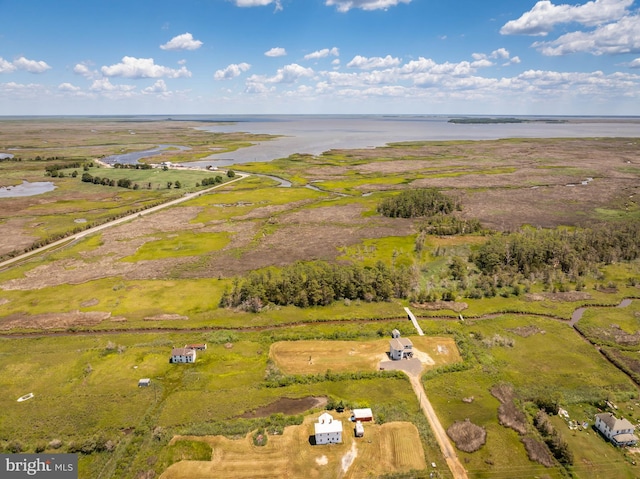 drone / aerial view with a water view and a rural view