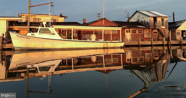 dock area featuring a water view