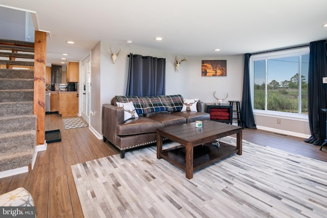 living room with light hardwood / wood-style floors