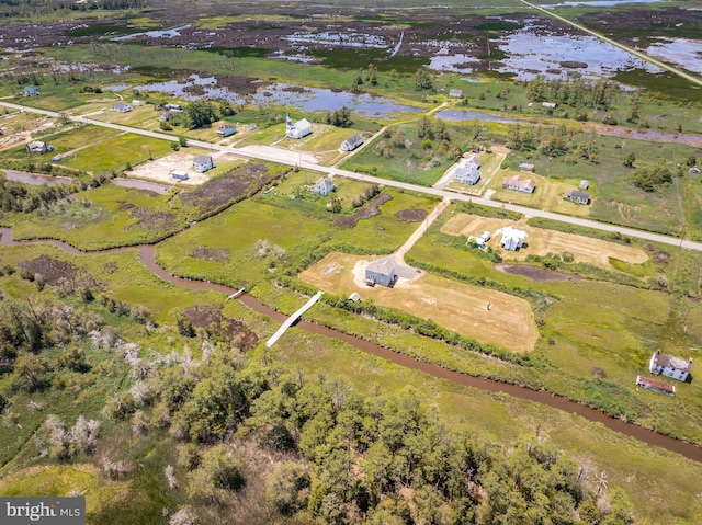 aerial view featuring a rural view and a water view