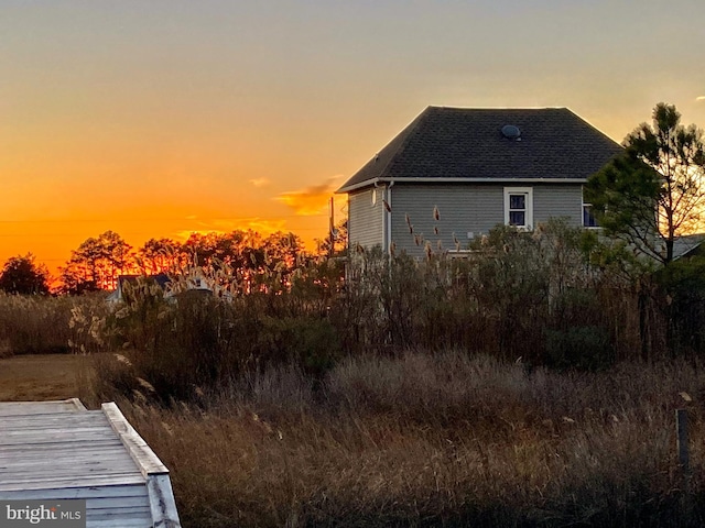 view of property exterior at dusk