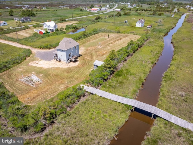 bird's eye view with a rural view and a water view