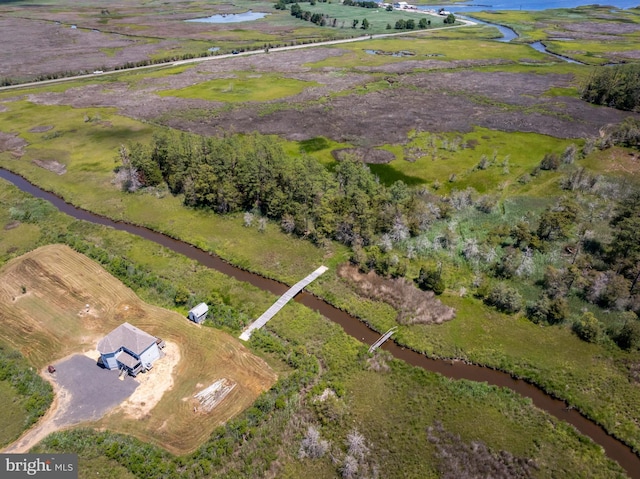 birds eye view of property with a rural view