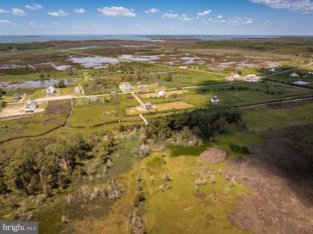 bird's eye view featuring a water view and a rural view