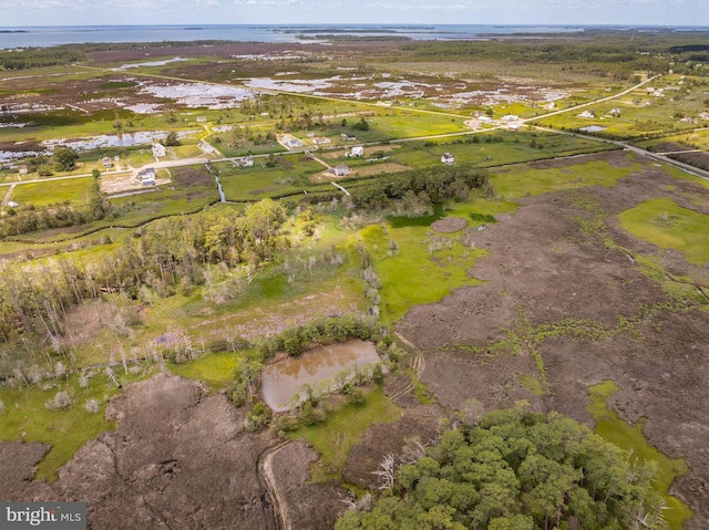 bird's eye view with a rural view and a water view