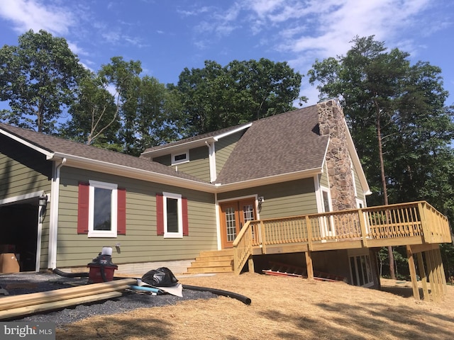 rear view of house with a deck