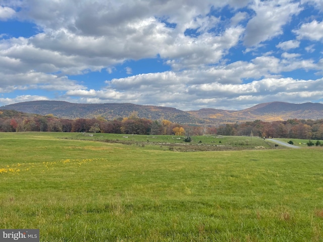 view of mountain feature with a rural view