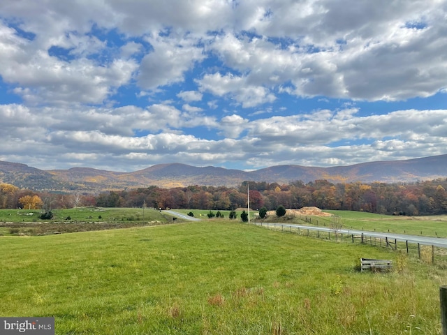 view of mountain feature with a rural view