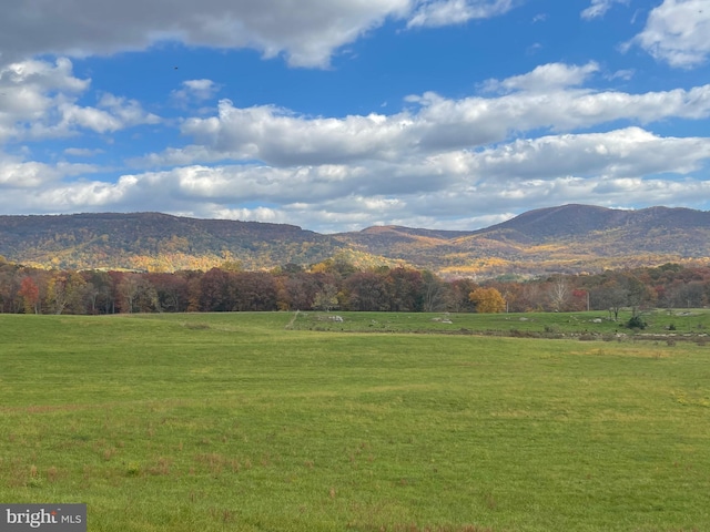 view of mountain feature with a rural view