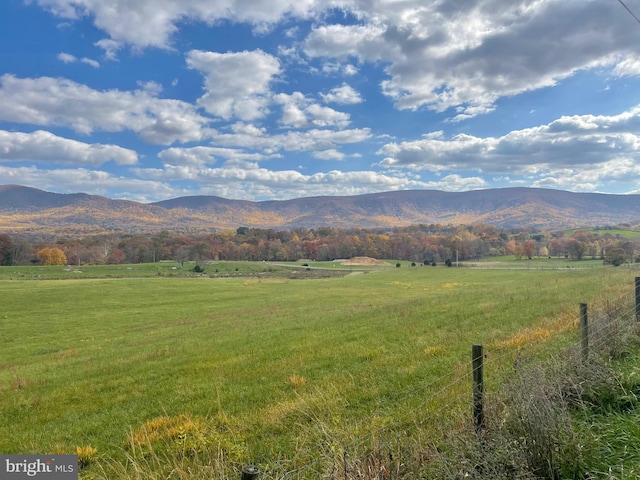 view of mountain feature featuring a rural view