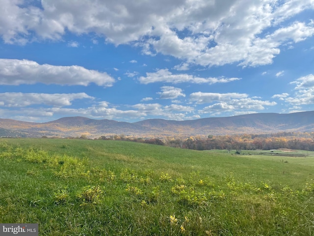 property view of mountains with a rural view