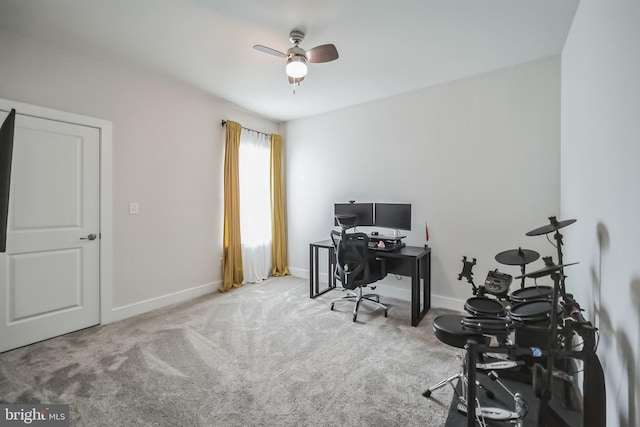 office area featuring ceiling fan and light colored carpet