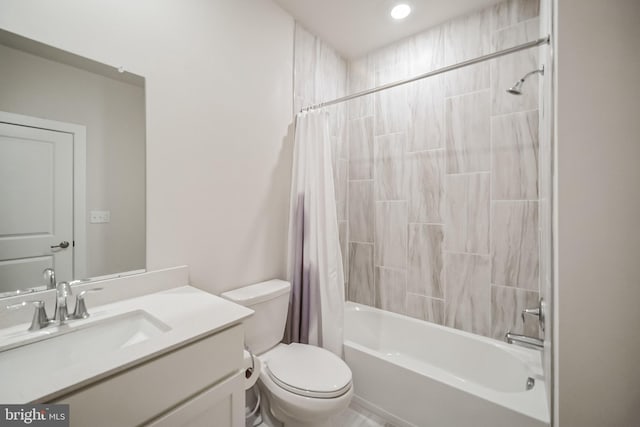 full bathroom with vanity, toilet, and shower / tub combo with curtain