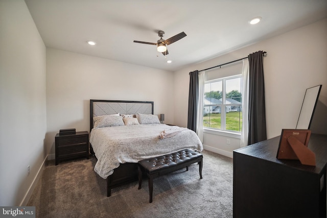 carpeted bedroom featuring ceiling fan