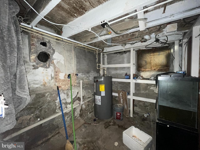 utility room featuring electric water heater