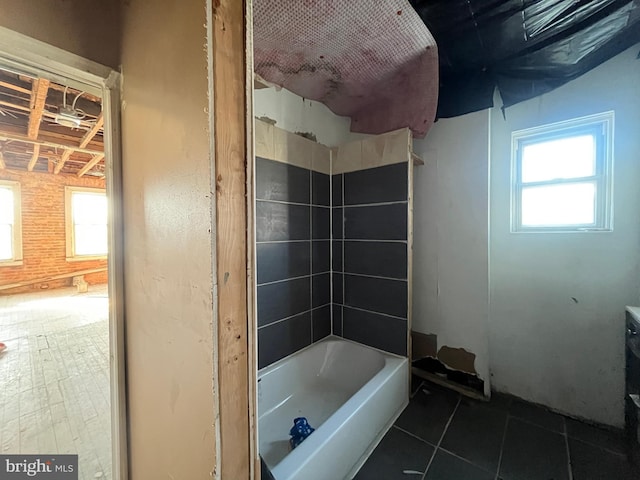 bathroom with tile patterned floors