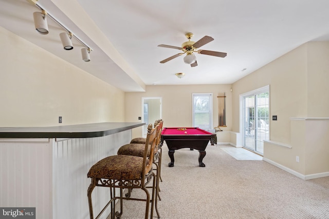 game room with ceiling fan, billiards, track lighting, bar, and light carpet