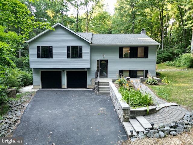 raised ranch with a garage