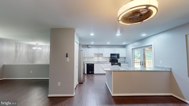 kitchen featuring black appliances, white cabinets, kitchen peninsula, light stone countertops, and dark wood-type flooring